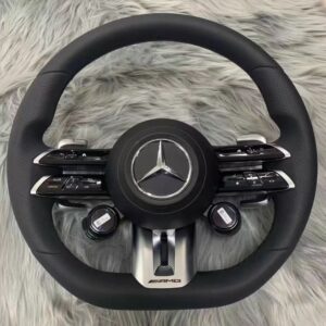 Mercedes-AMG "Dragonfly Style" sports steering wheel with integrated control knobs, designed to fit a wide range of Mercedes-Benz models including the C-Class (W205), E-Class (W213), GLC (X253), and GLE (W167).